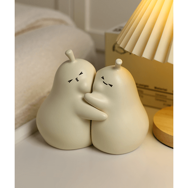 Hugging Cartoon Pear Book Stand Porcelain Ornament