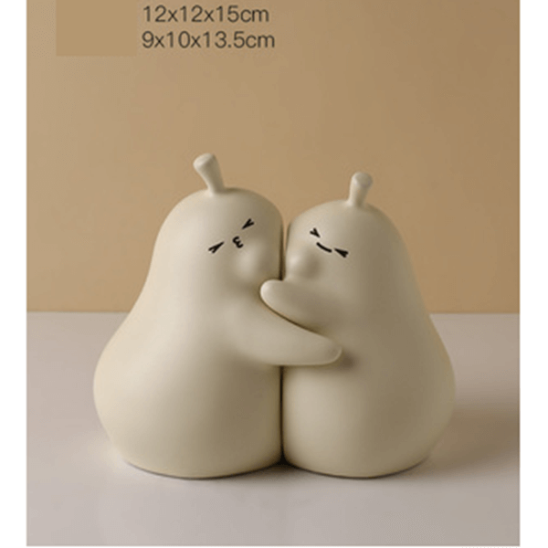 Hugging Cartoon Pear Book Stand Porcelain Ornament
