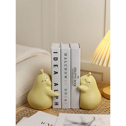 Hugging Cartoon Pear Book Stand Porcelain Ornament