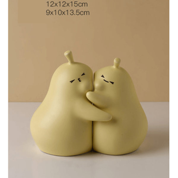 Hugging Cartoon Pear Book Stand Porcelain Ornament