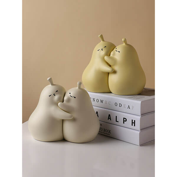 Hugging Cartoon Pear Book Stand Porcelain Ornament